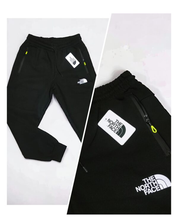 Pantalon con puño frisado The North Face.